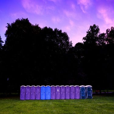 portable toilets in the fields