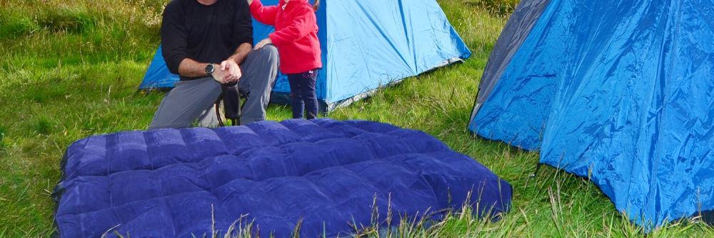 camping-mattress-outside-tents