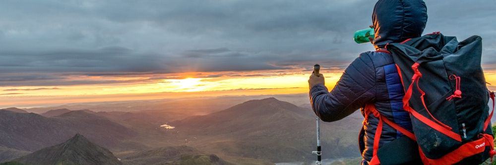 trekking pole with sunset view